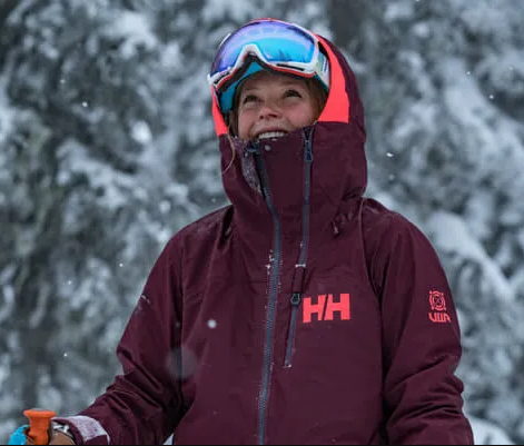 Female skier wearing a Helly Hansen jacket