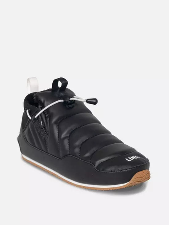 Black insulated shoe with white sole on a light gray background