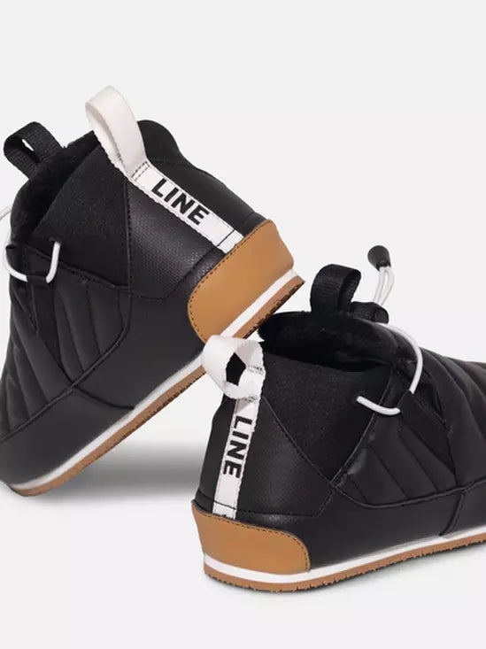 Black high-top sneakers with brown accents and 'LINE' branding on a white background