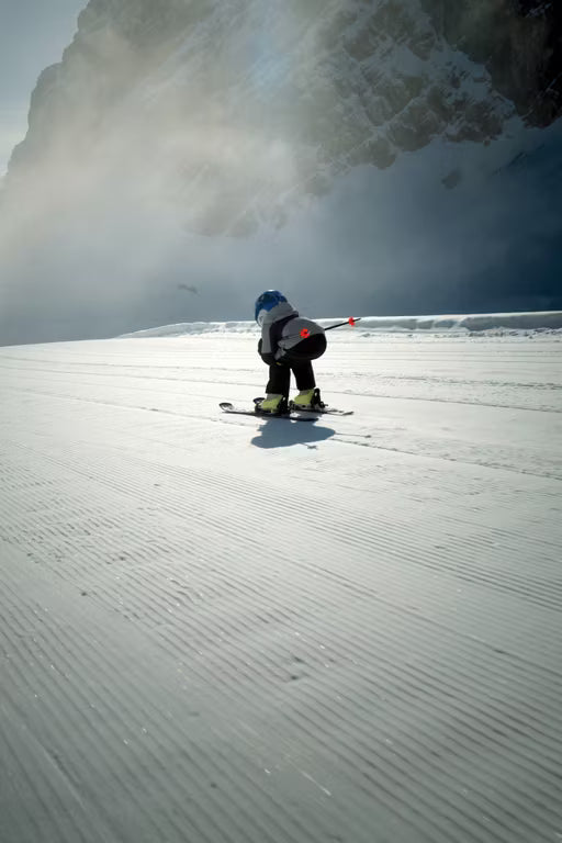 Junior Skier skiing on snow using Yellow Fischer One Ski Boot 2026